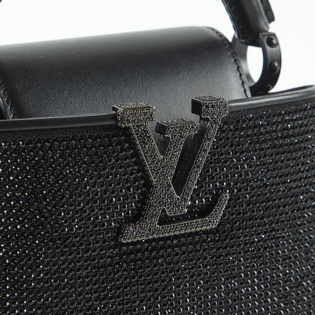 Louis Vuitton
Capucines Glitter Handbag