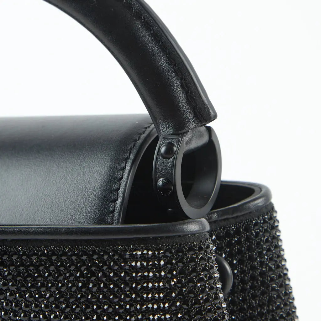 Louis Vuitton
Capucines Glitter Handbag