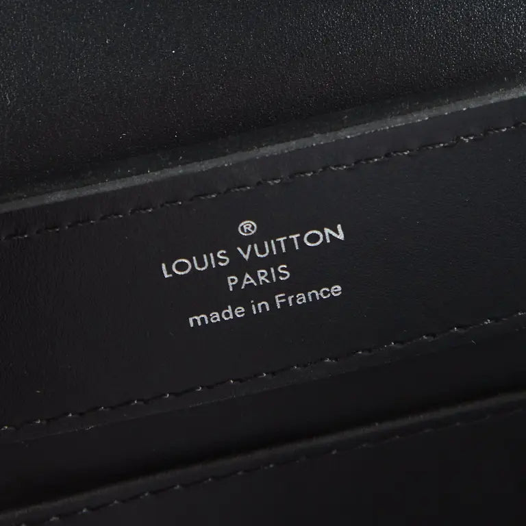 Louis Vuitton
Capucines Glitter Handbag